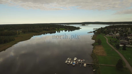 Fårön Island, Piteå Archipelago: Stunning Aerial Landscape with Forests, Calm Waters, and Boats