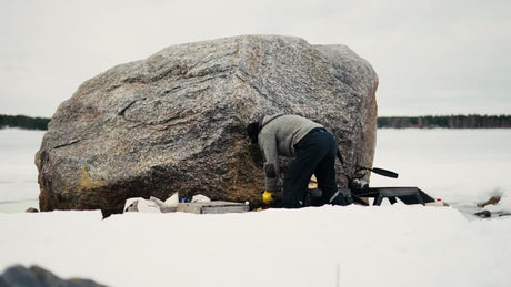 Winter in the Luleå Archipelago: Man by Fire on Frozen Lake