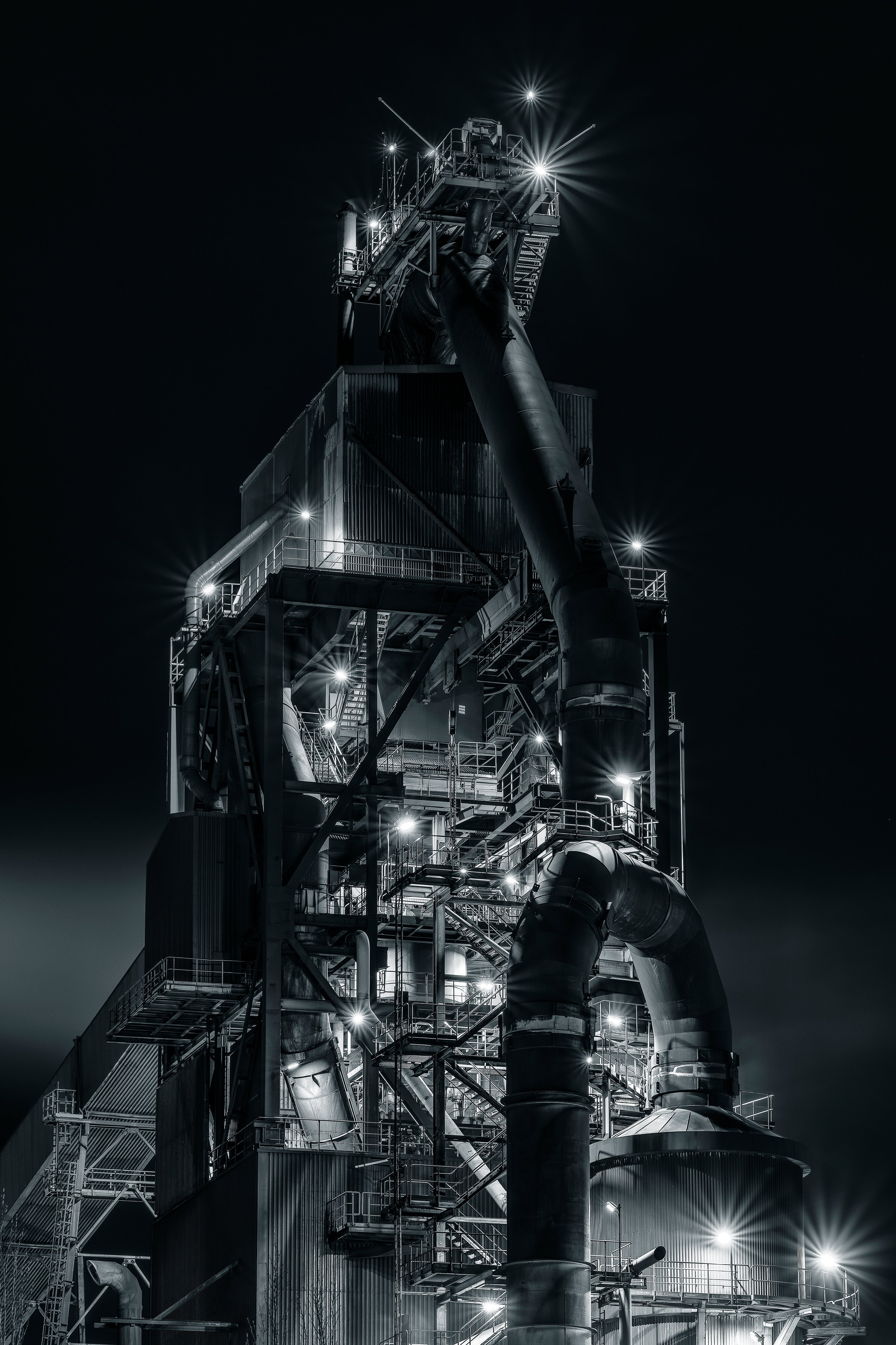 SSAB Industrial plant structure with large pipes at night