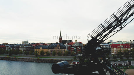 Luleå, Sweden Cityscape in Autumn With a Crane in the Foreground