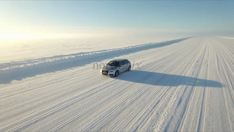 Driving on a Snow-Covered Ice Road in Luleå, Sweden, Winter