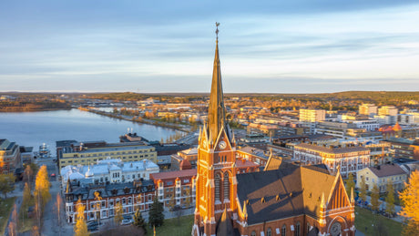 Aerial Timelapse of Luleå Cathedral and Cityscape at Sunset