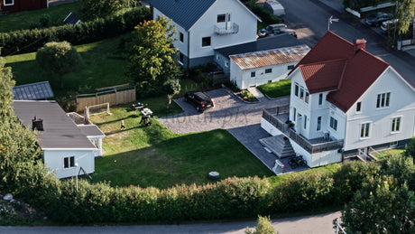 Aerial View of Family Home in Lulea, Sweden, on a Sunny Summer Evening