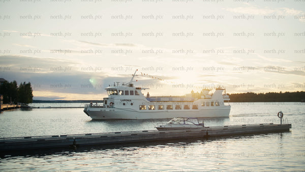 Tour boat Laponia on Luleå river at sunset in Luleå
