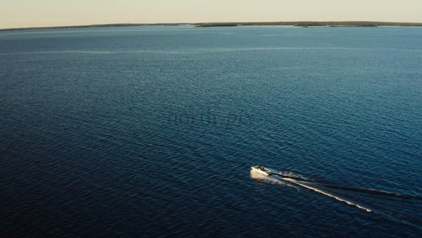 Summer in Luleå Archipelago: Motorboat Cruising on a Bright Day