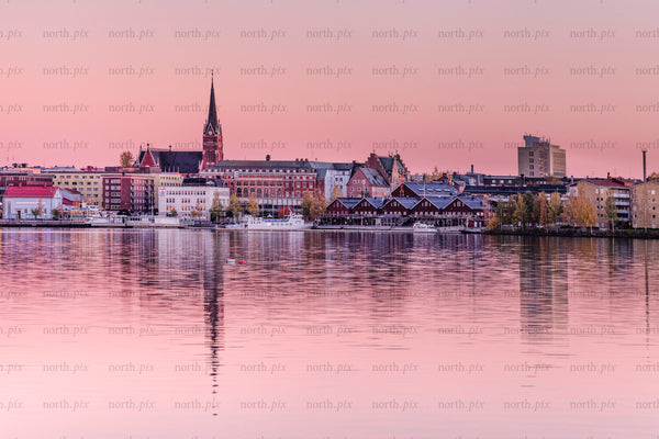 Norra hamn waterfront with church spire at sunset