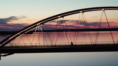 Sunset Bike Ride Over Lulea River: A Serene Summer Evening in Sweden
