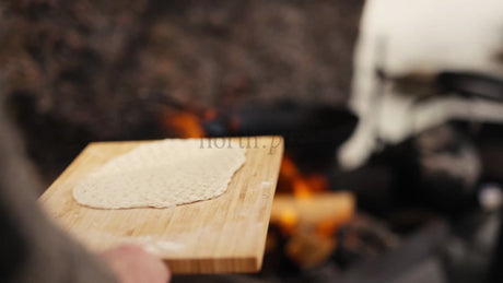 Cooking Flatbread Over a Campfire in the Luleå Archipelago, Winter Scene
