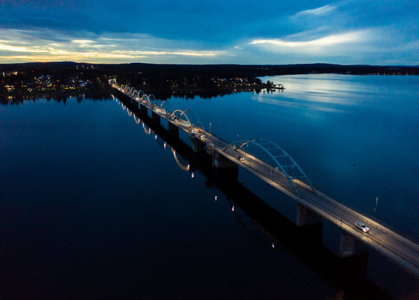 Bridge over calm waters during blue hour in Luleå Sweden