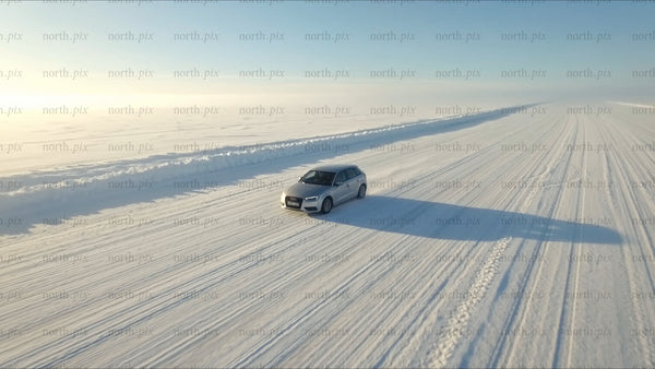 Driving on a snow-covered ice road in Luleå, winter