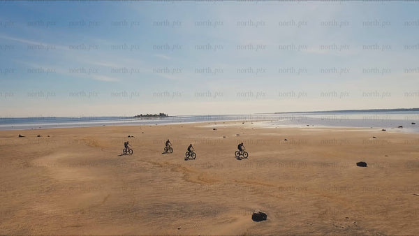 Fat biking on a sunny summer day in Luleå: A coastal drone adventure