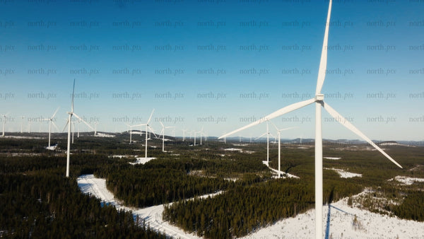 Markbygden wind farm: Aerial view of green energy in winter landscape