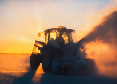 Snow Removal Tractor During Sunrise Winter Landscape Scene