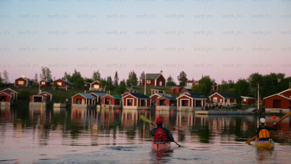 Kayaking in the Luleå archipelago at twilight