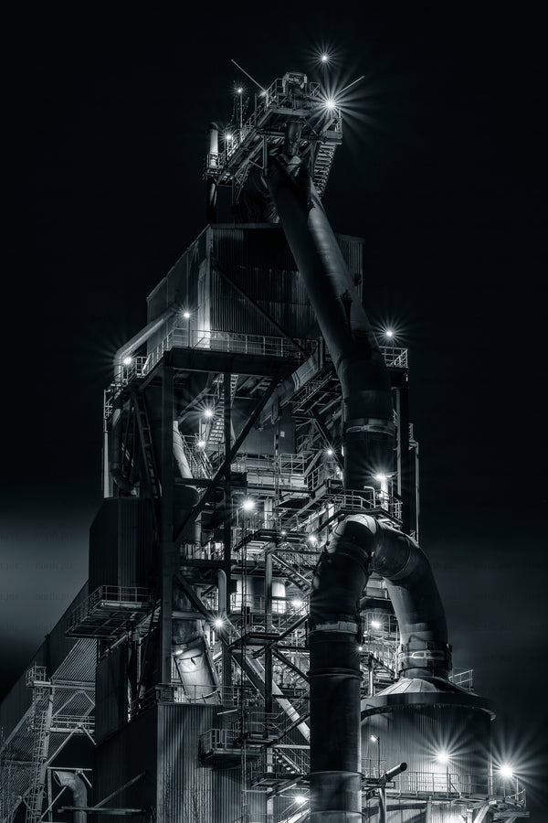 SSAB industrial plant structure with large pipes at night