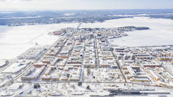 Aerial timelapse of snow-covered Luleå in winter
