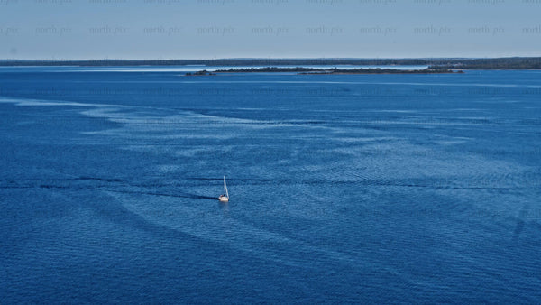 Sailboat in Luleå archipelago: A sunny summer day