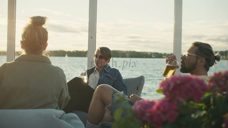 Friends Enjoying Summer Evening Drinks in Luleå, Sweden