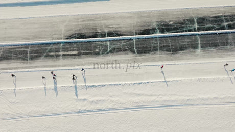 Winter Ice Skating on Frozen Lake in Luleå, Sweden - Aerial Drone View