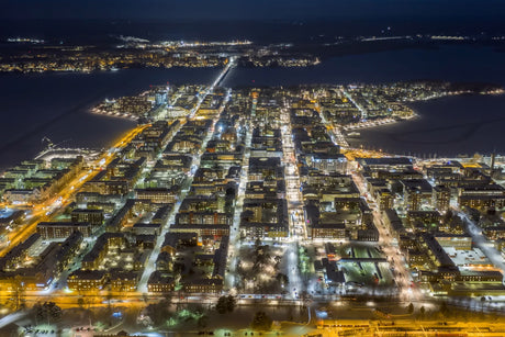Aerial Night View Of Luleå City Center With Bright Streets And Waterfront Lights