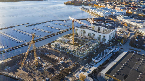 Construction site timelapse in Luleå - aerial view of building progress and urban development