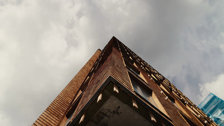 Modern Wood Building: Low Angle View with Upward Pan of the Wooden Architecture