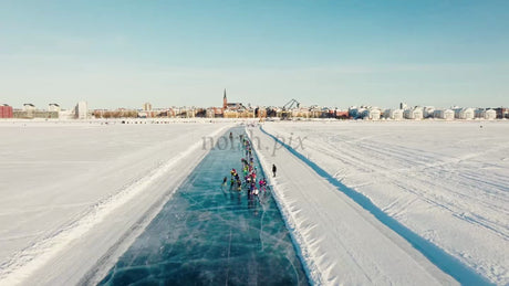 Winter Ice Skating Race in Luleå, Sweden: A Sunny Day Drone View