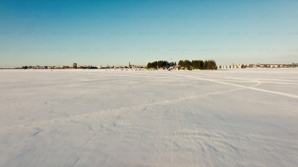 Winter in Luleå: Aerial drone footage of frozen lake and island gathering