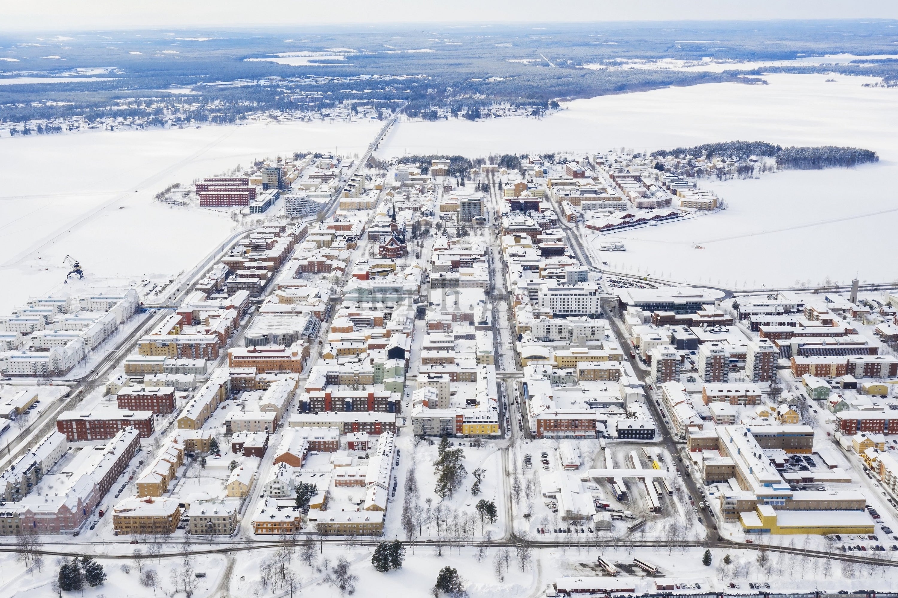 Aerial View Of Lulea City Center In Winter Snowy Landscape From Above