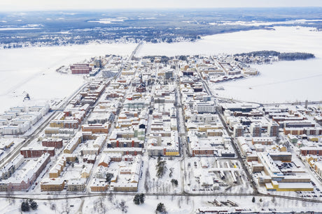Aerial View Of Lulea City Center In Winter Snowy Landscape From Above