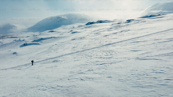 Solo skier in snowy mountains of Riksgränsen