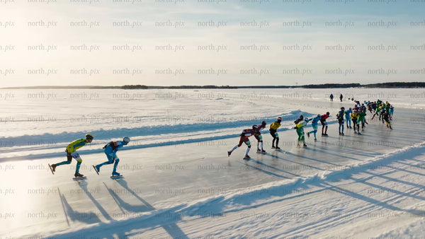 Speed skating on a frozen lake in Luleå, on a bright winter day
