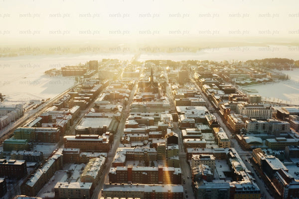 Aerial view of Luleå city center at sunrise in snowy winter morning