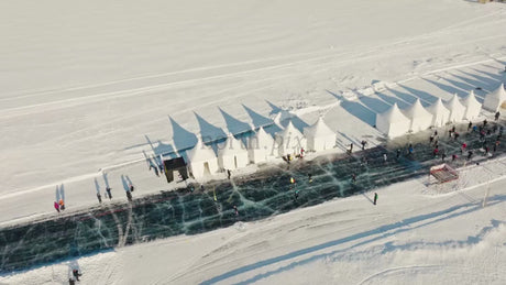 Winter Ice Skating on Frozen Lake in Luleå, Sweden: Drone View