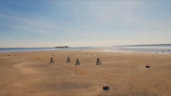 Fat biking on a sunny summer day in Luleå: A coastal drone adventure