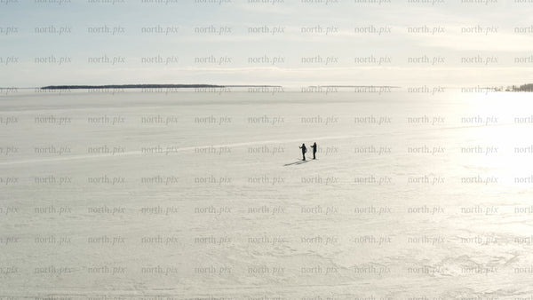 Winter cross-country skiing on frozen lake in Luleå