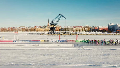 Winter Snowmobile Race on Frozen Lake in Luleå, Sweden, Drone View