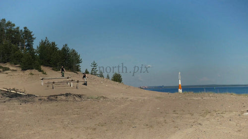 Summer fatbiking adventure: Friends exploring the coastal sands of Luleå