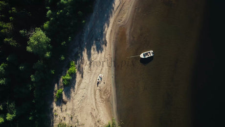 Summer Day in Luleå Archipelago: Aerial View of Beach, Boat, and People