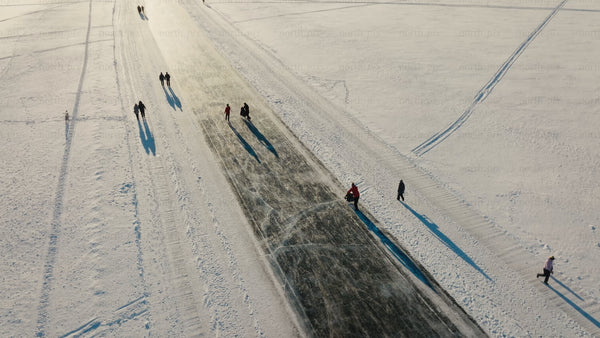 Aerial view of people enjoying a frozen road in winter Luleå