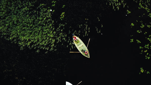 Summer rowing: Aerial view of boats on a lake in Luleå