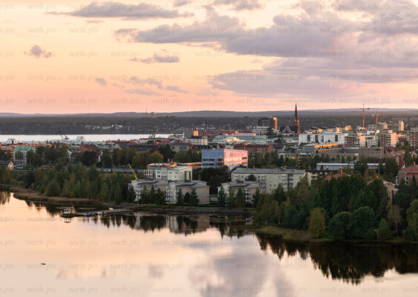 City skyline and river at sunset