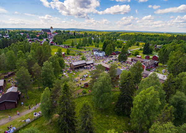 Summer festival scene in Swedish countryside from above at daytime