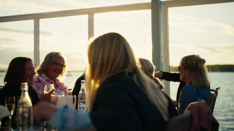 Friends and Family Enjoy Sunset Dinner in Lulea, Sweden