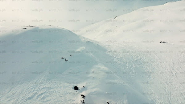 Snowy mountain landscape in riksgransen, Sweden - aerial drone view