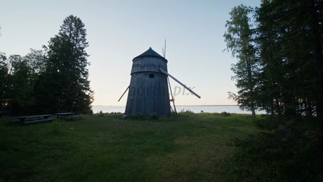 Old Wooden Windmill on a Remote Swedish Coastal Island at Twilight in Summer
