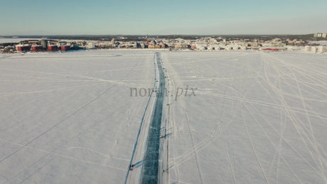Winter in Luleå: Aerial View of Ice Skating on a Frozen Track
