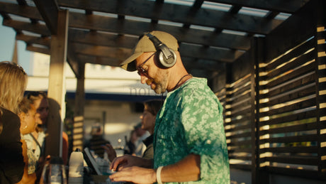 DJ Playing Music at a Summer Urban Golden Hour Event in Lulea, Sweden