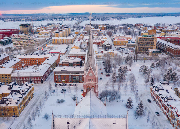 Drone view of Luleå city in winter during blue hour