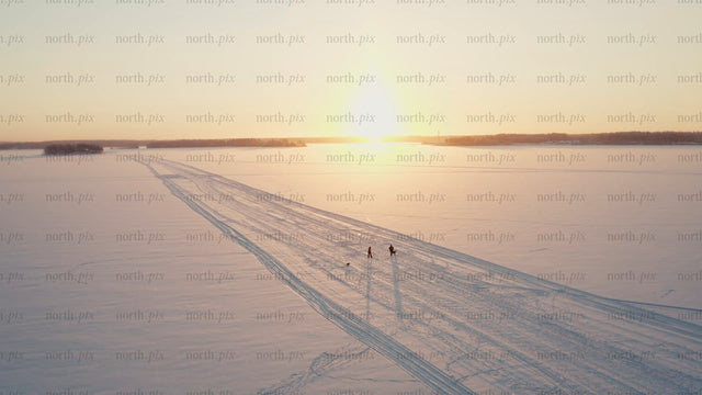 Winter sunset walk on a frozen lake in Luleå
